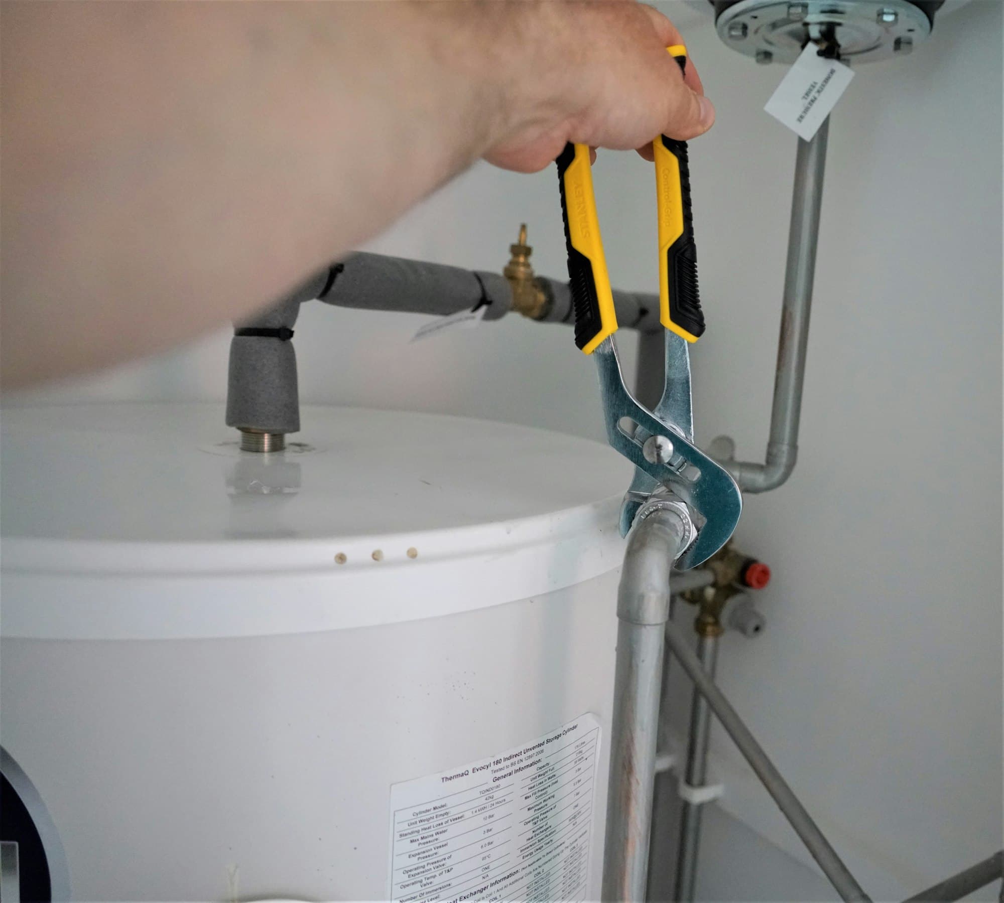 Plumber working on a water heater