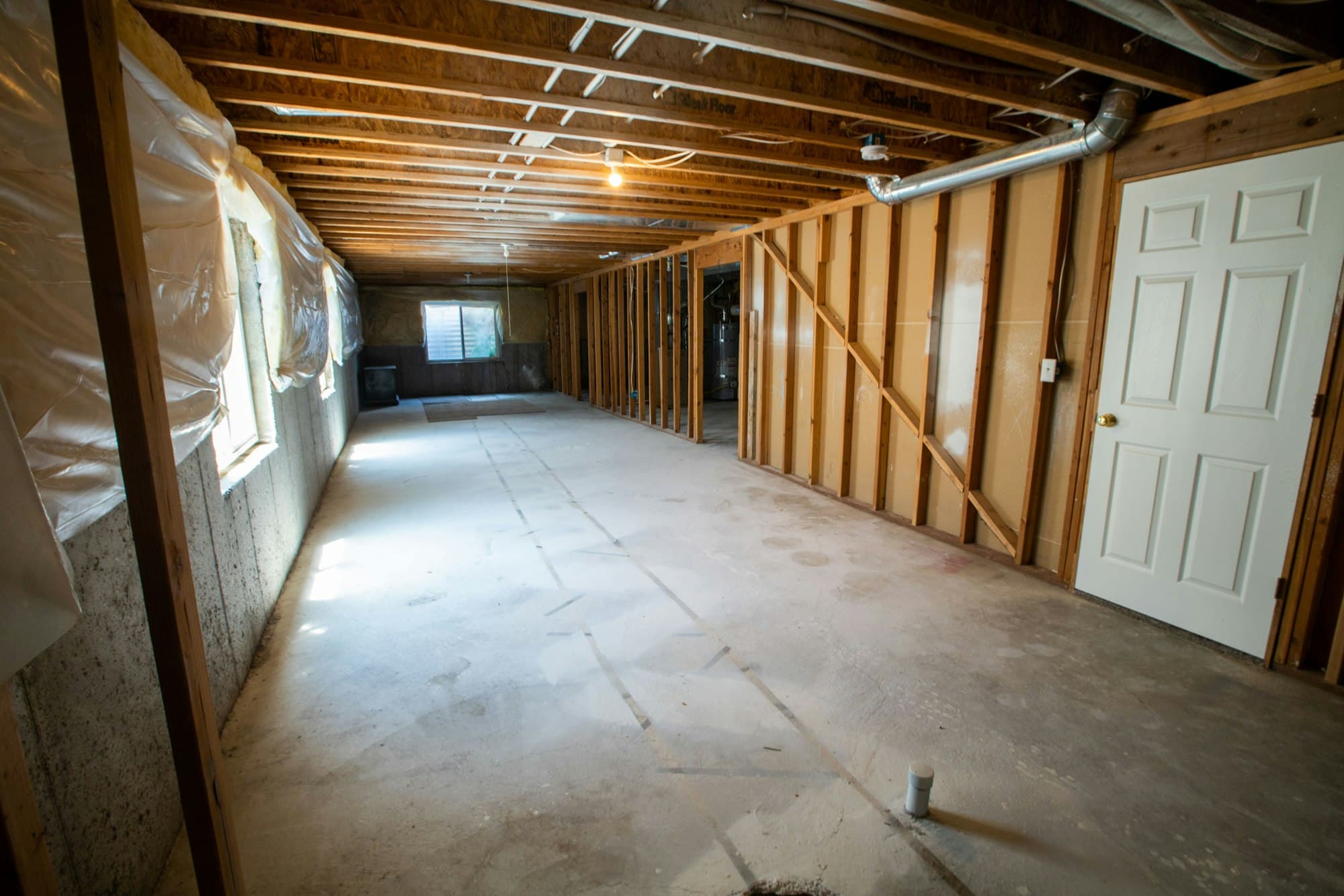 Basement stripped to the framing during restoration